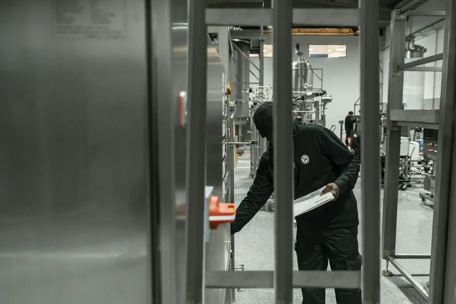 An engineer inspecting plant equipment